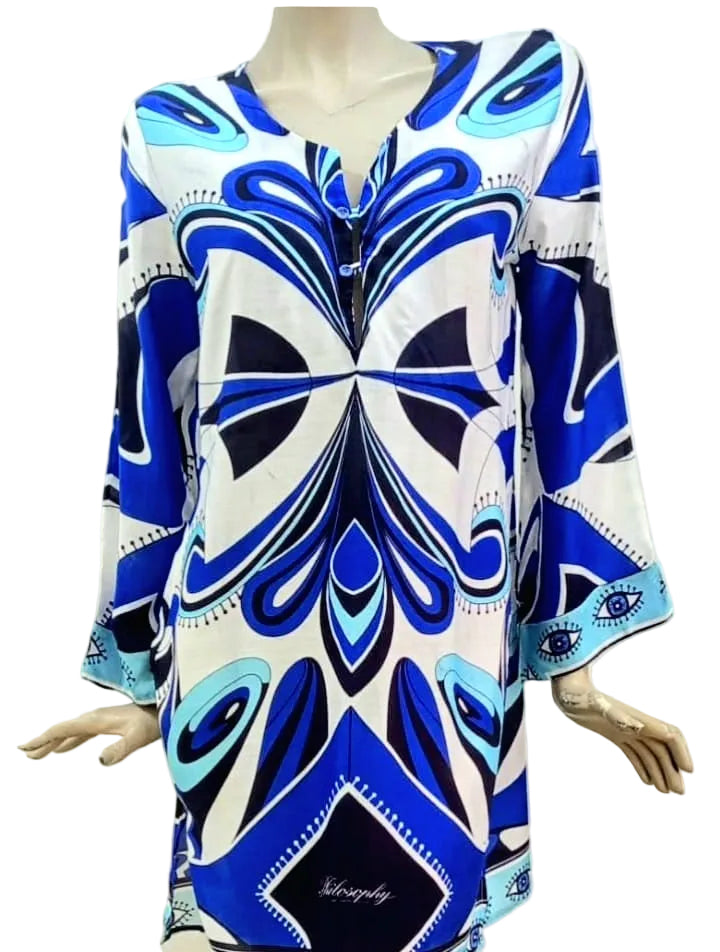 Blue and white short tunic dress on a mannequin against a plain background