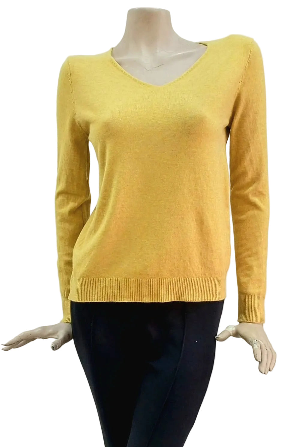 Yellow butter soft classic v neck sweater on a mannequin against a white background