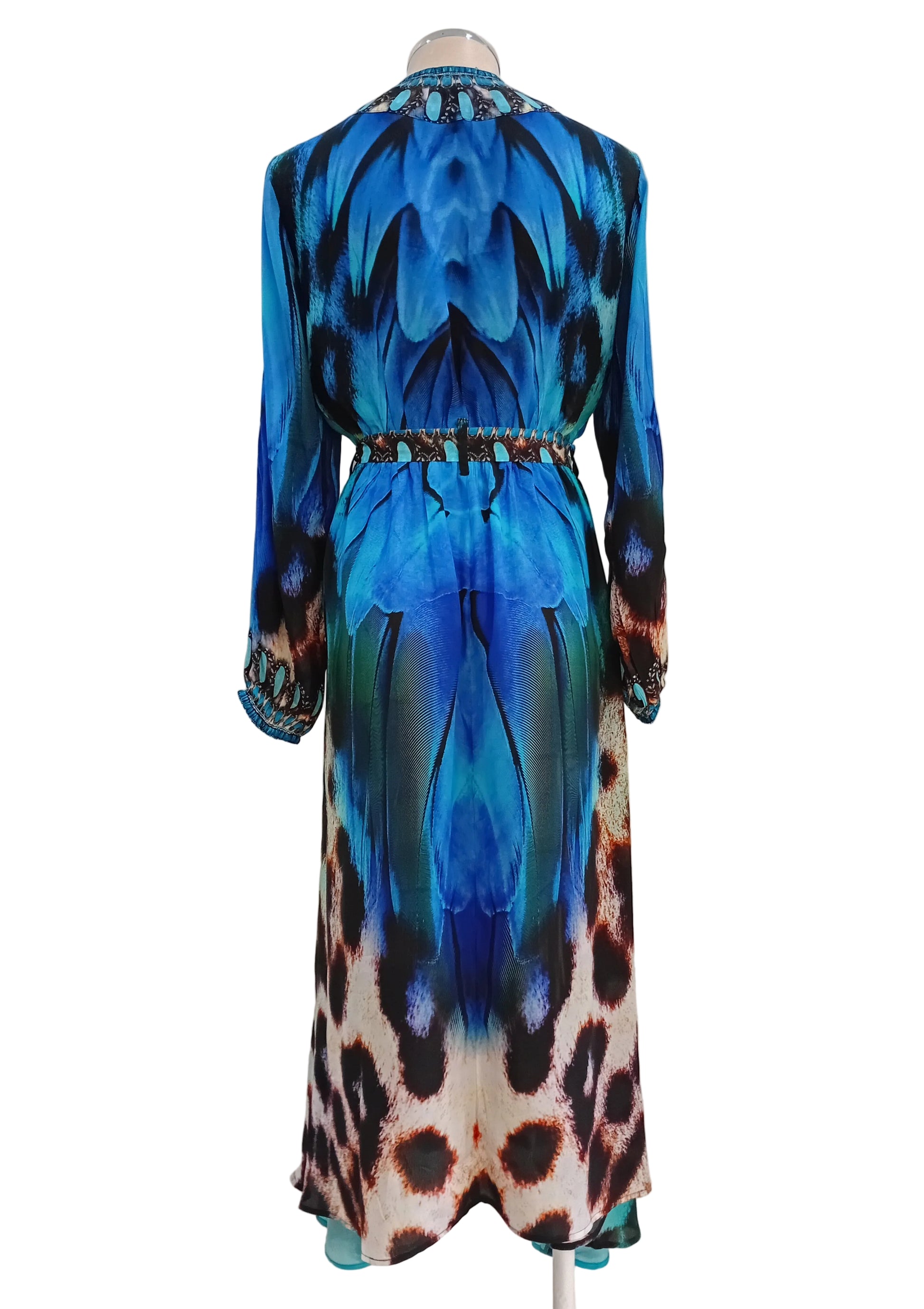 Blue and leopard print dress against a white background