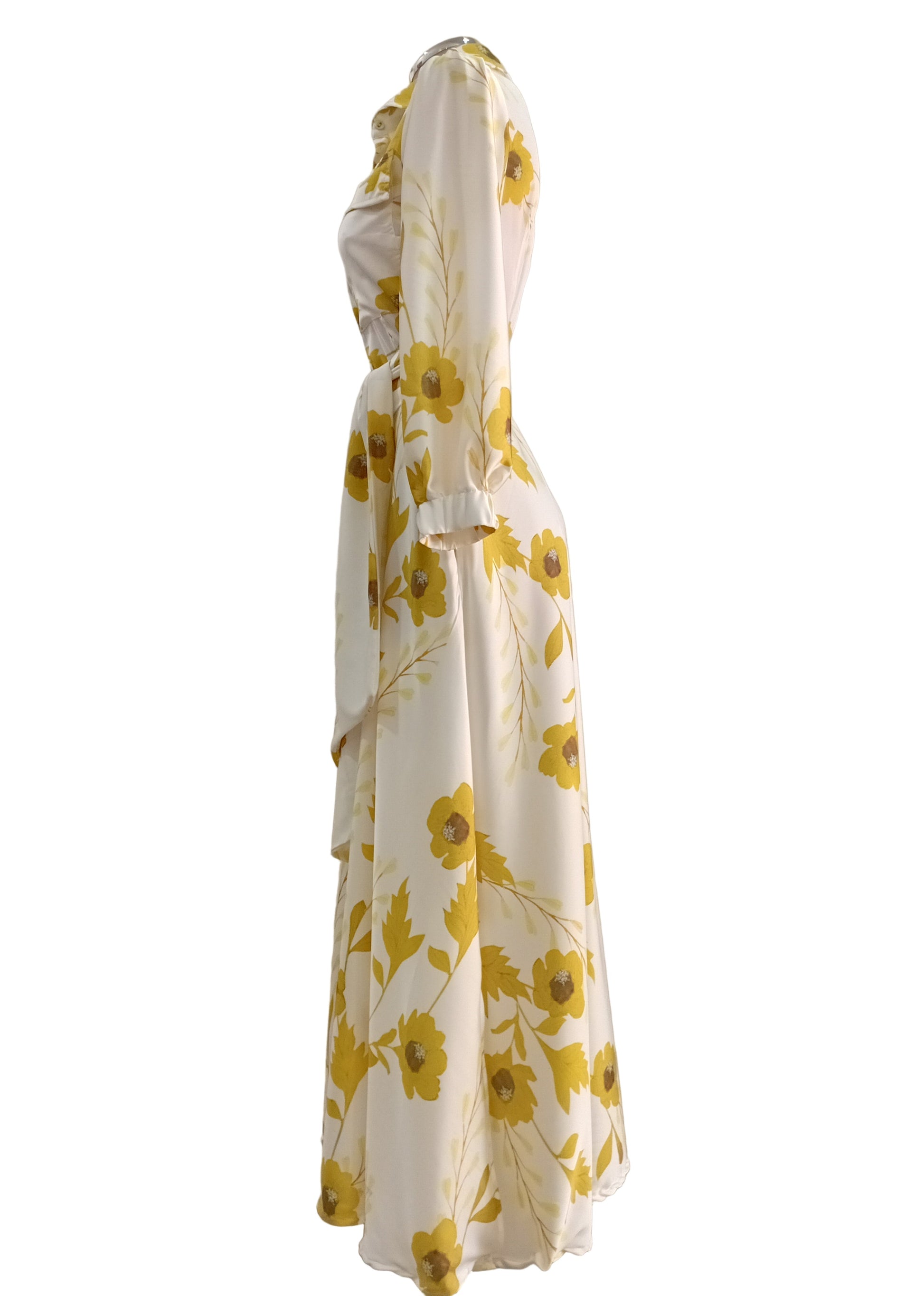 Shirtwaister dress with yellow foral pattern on a white background