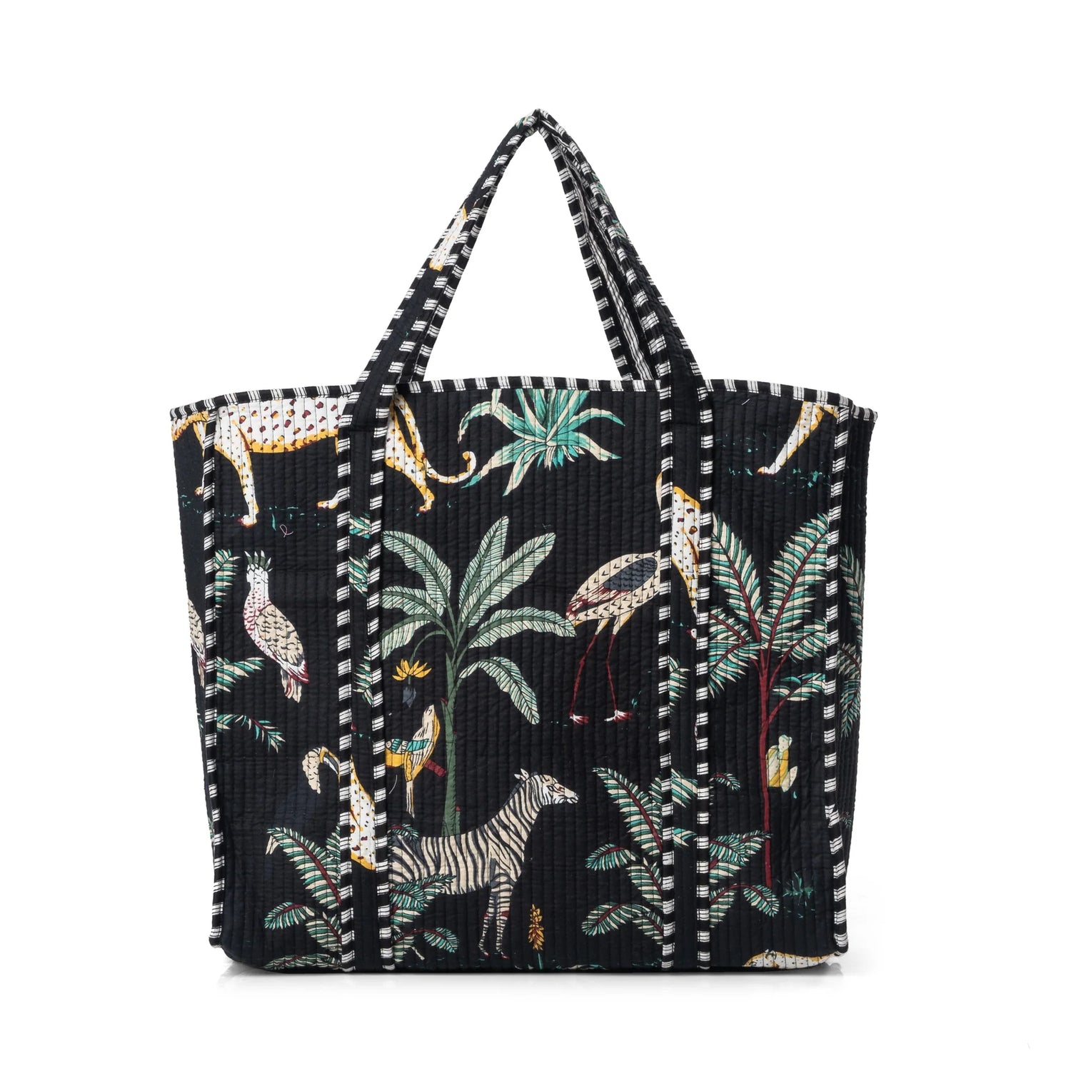 Tote bag with animal and plant pattern on a black background