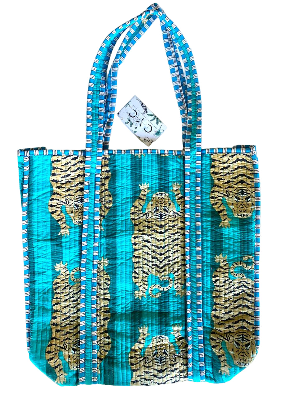 Tote bag with tiger design on a turquoise background