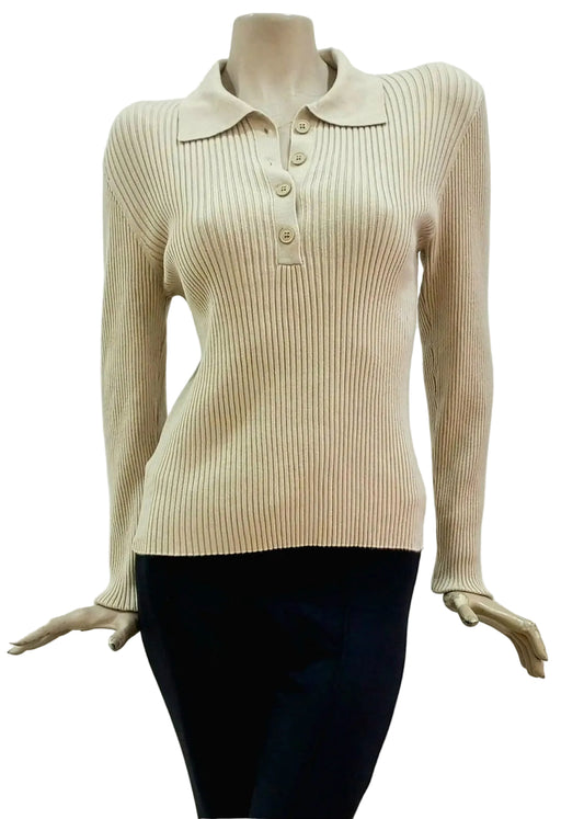 Stone ribbed sweater with collar on a mannequin against a plain background
