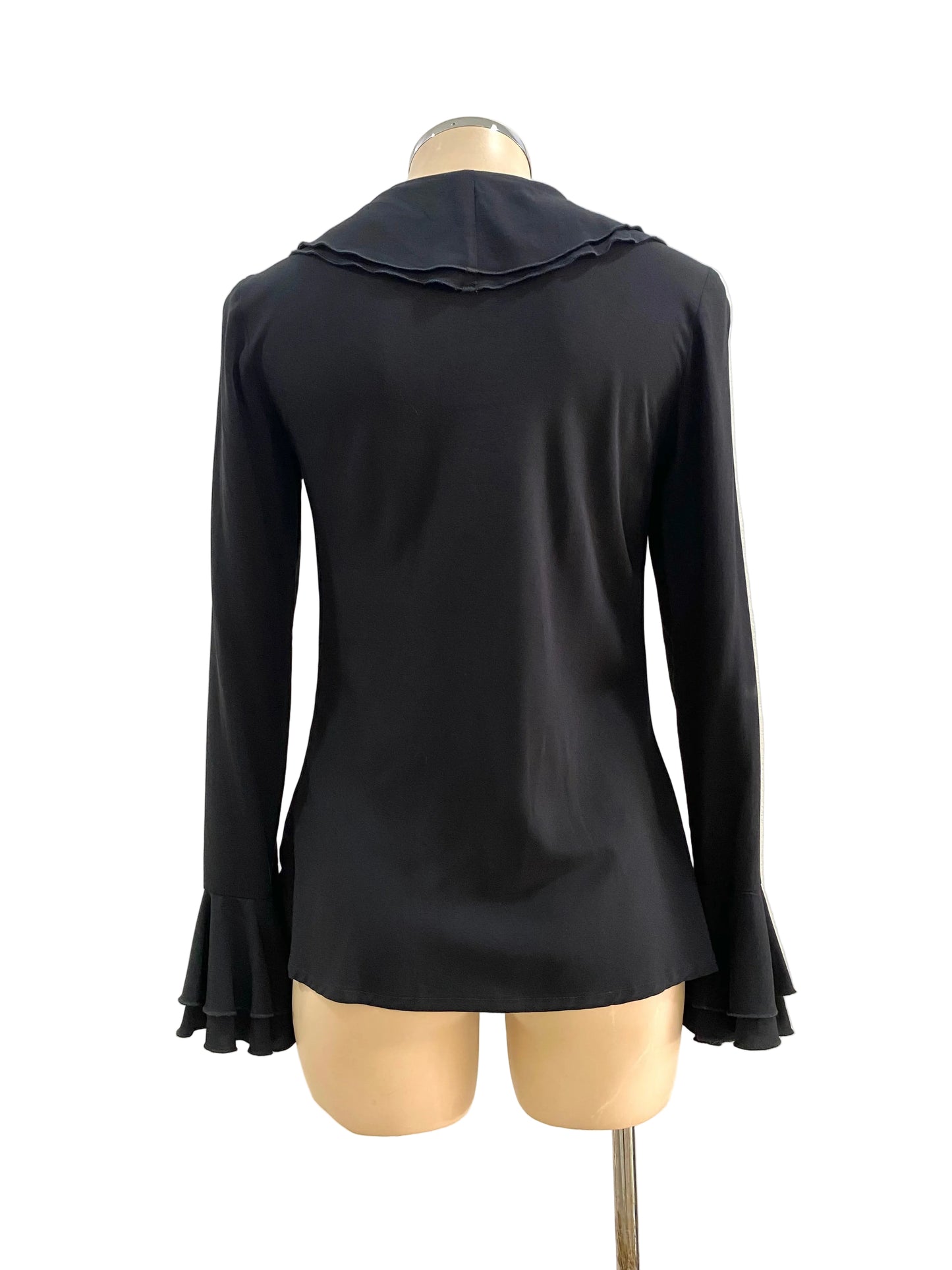 Black ruffled long-sleeve top on a mannequin against a white background
