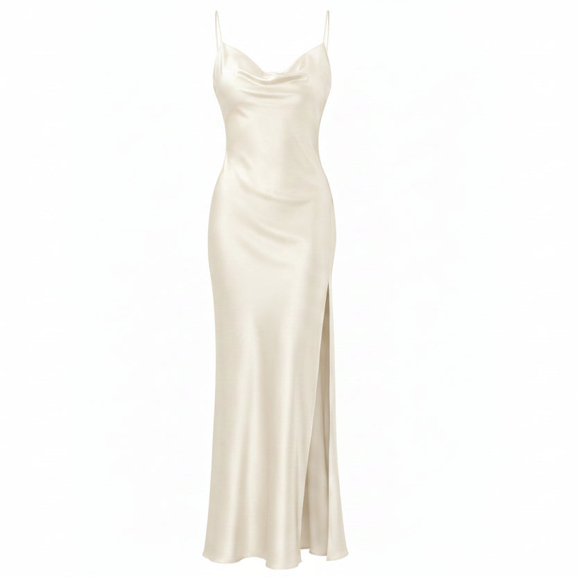 Ivory satin evening gown with thin straps on a white background