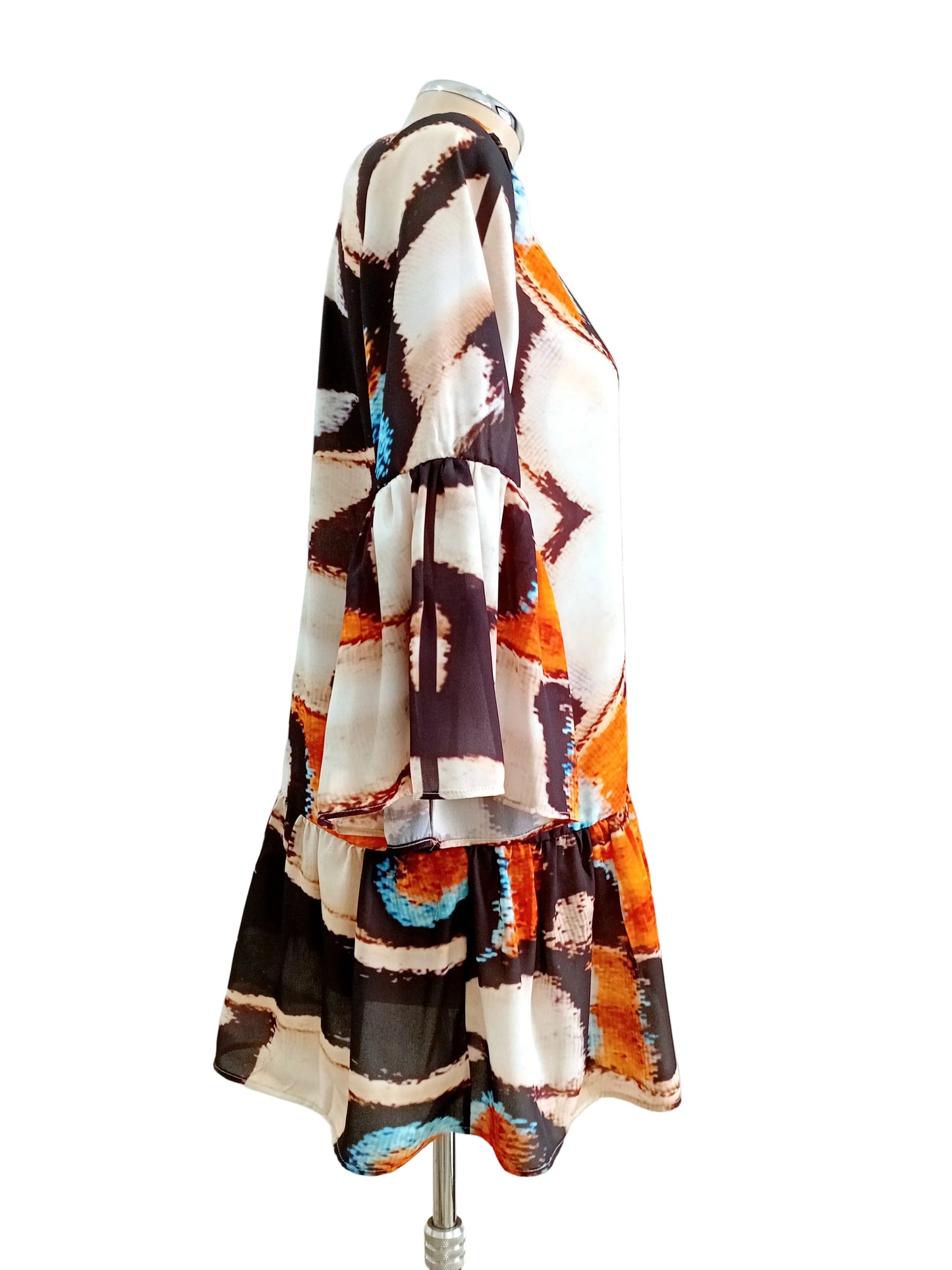 Colorful patterned Zen Butterfly dress against a white background